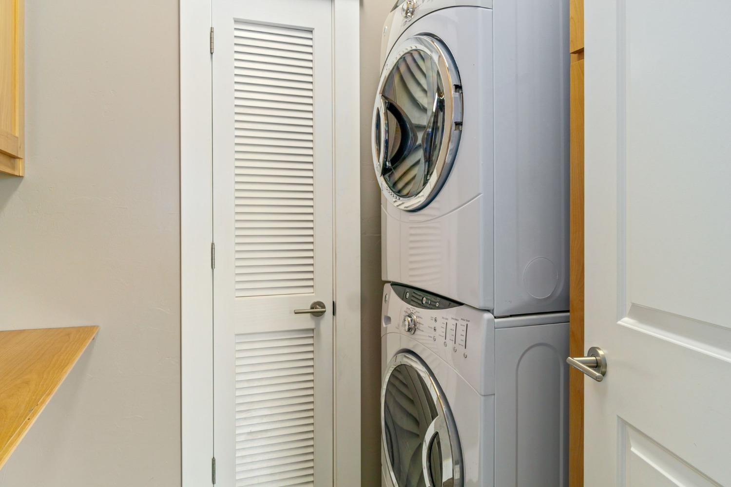 Laundry Room with Stacked washer and dryer