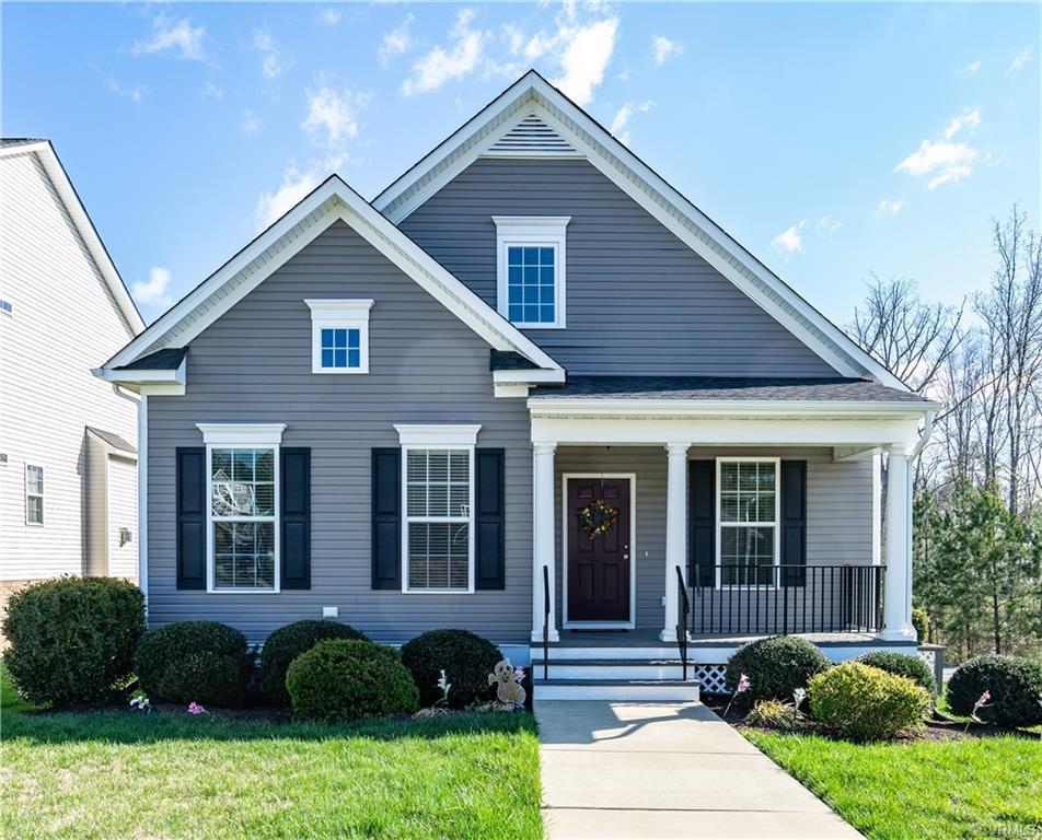 Welcome to 14724 Bridge Creek Dr.  This Energy-Star certified home has a $52,000 SOLAR Panel system installed in 2020 making the utility bills very low for the next 25+ years.  First floor primary & finished basement! No More Yard Work; HOA takes care of cutting grass! This home has an open concept, a sunny great room with beautiful hardwood flooring; spacious kitchen with granite countertops, center island w/bar seating, gas cooktop, wall oven & soft close drawers. Flex room off front porch can be used as a sitting, dining room, or office. Master suite on the main level, with walk-in closet and En Suite Bathroom with dual-sink vanity & walk-in shower with seat. Two spacious bedrooms on the second floor share a full bath. Finished basement with Rec room and 3rd full bath.   Large basement storage room holds everything, and unfinished walk-out workshop area can easily be finished for a fourth bedroom.  Upgraded HVAC, plus 220 v connections. The corner location offers unique privacy and wooded views from the deck and patio below. Conveniently located just off Midlothian Turnpike & 288, easy commute and quick access to hospitals, dining, retail & entertainment.  Great School System!