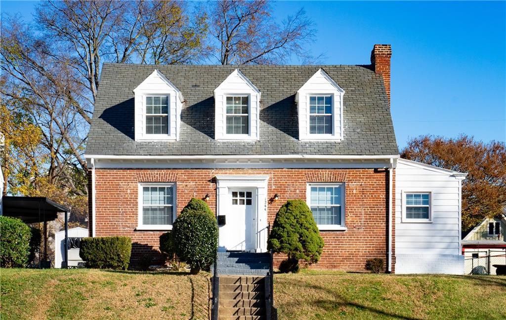 Wow VCU area and convenient to everything!!! This is a unique Brick home that is totally finished and ready to be used in the best way that fits your family!!! The home sits on a 6875 sq. ft. rolling hills lot with an iron rail entry way! With parking on the street and private parking in the back, access to the first level is easily accomplished through the updated kitchen or basement entrance! You will be swept away entering the front foyer that boasts formal living and dining rooms and a wide "Gone With The Wind Stairway" that leads to the second level Master Bedroom and two additional bedrooms and full bath! The 4th bedroom/office/exercise room is on the first level!
The Full Basement is amazing with 7.6 foot ceilings, totally finished and totally dry!!! With a new Hot Water Heater installed, and a new HVAC System installed before closing and updated windows all over makes this a real winner for a personal residential purchase or investment property, a must see for sure!!!