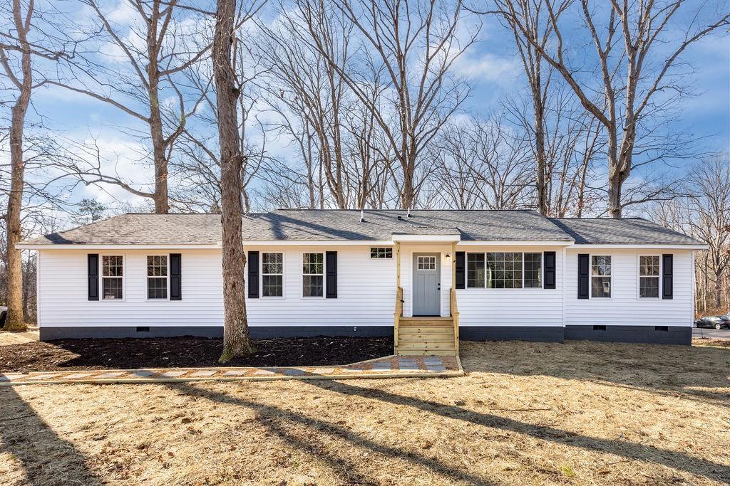 Fully renovated 4 bedroom rancher sitting on a lovely 1 acre, partially wooded lot in Chester. This 