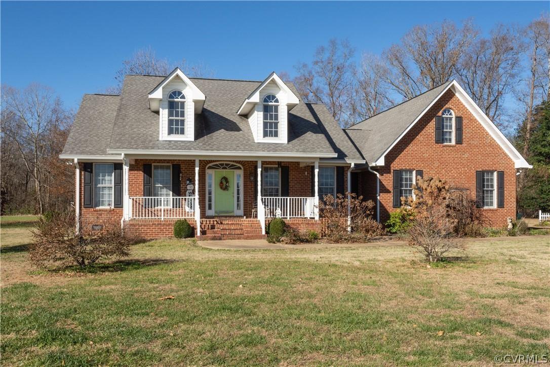 This custom built fully Brick wrapped home on 10 acres+ welcomes you with an oversized front porch. 