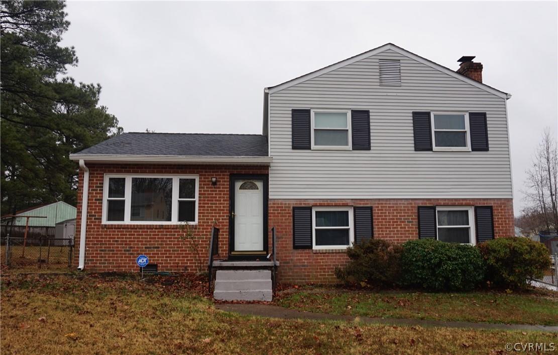 Brick and vinyl trilevel home in Fair Oaks Terrace.  3 beds/2 full baths (homeowner is using a study