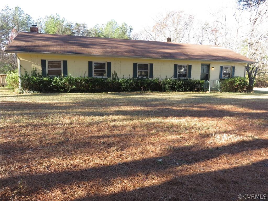 Ranch style home on 1.53 acres in a super convenient Henrico County location! From the side entry, s