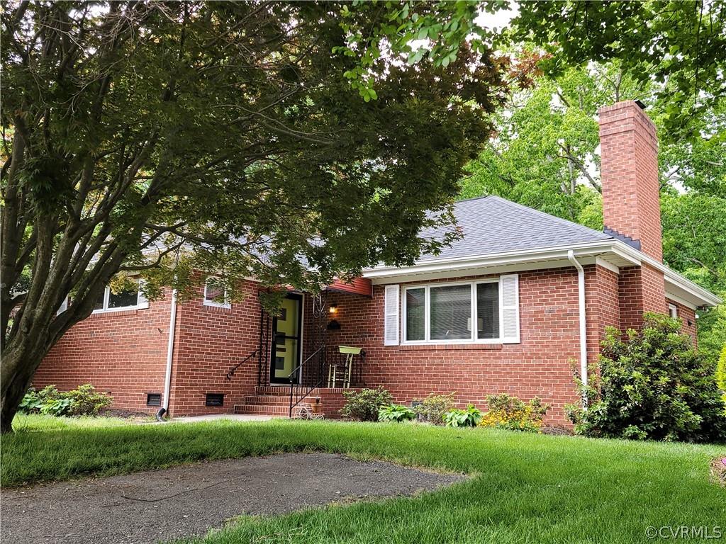 Don't miss this updated, well maintained Mid-Century brick ranch in a great location on Wythe Av in 