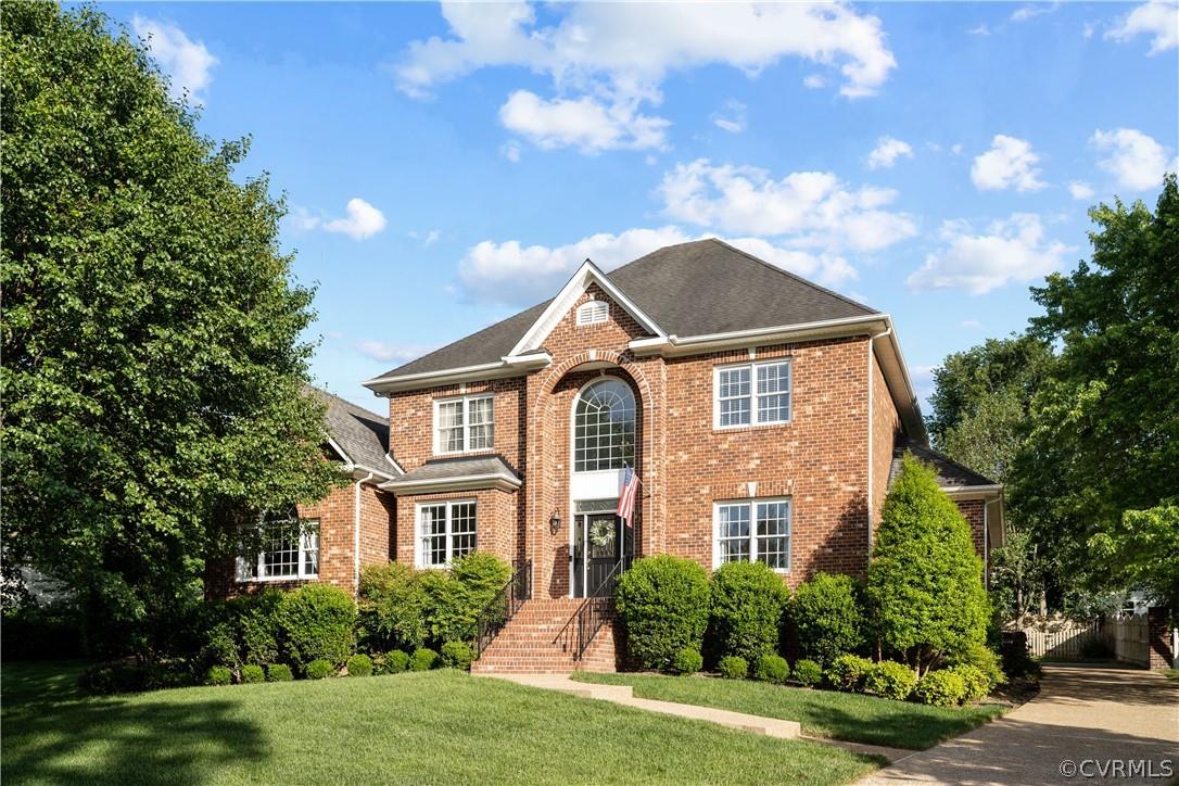 Inside this brick beauty in the Stonehenge neighborhood you are greeted by vaulted ceilings & wood f