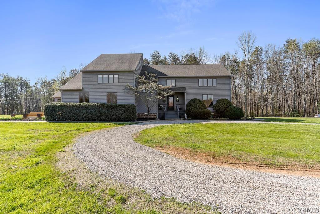 Elegance meets private country living with this extraordinary 34 acre Hanover County estate. The cus