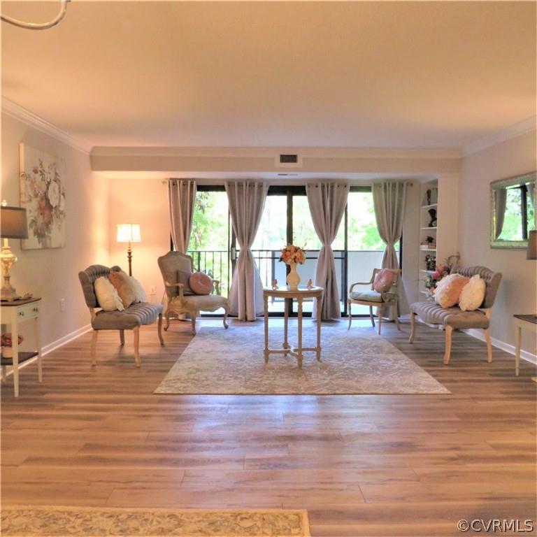 Renovated two bedroom condo- features a Dining room with new chandelier, Living room with built ins 