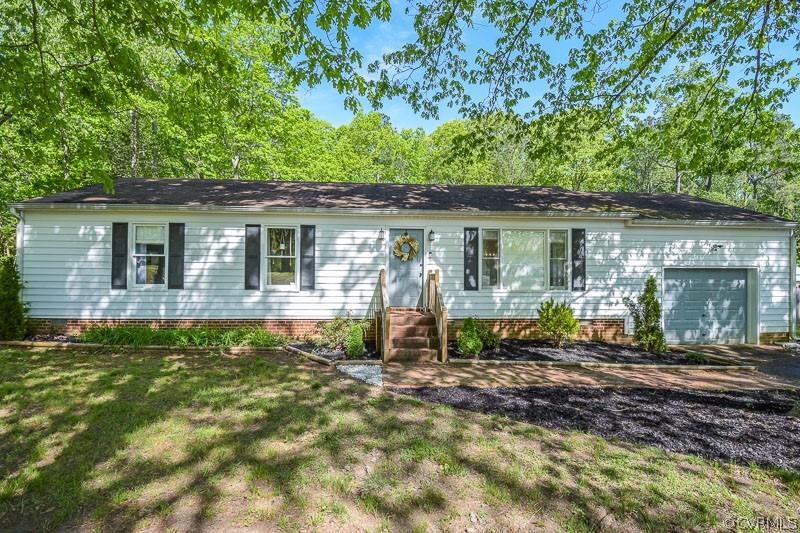 Cute Ranch Style Home Featuring 1,200 Square Feet Sitting on Over a Half Acre Lot!  The nice size li