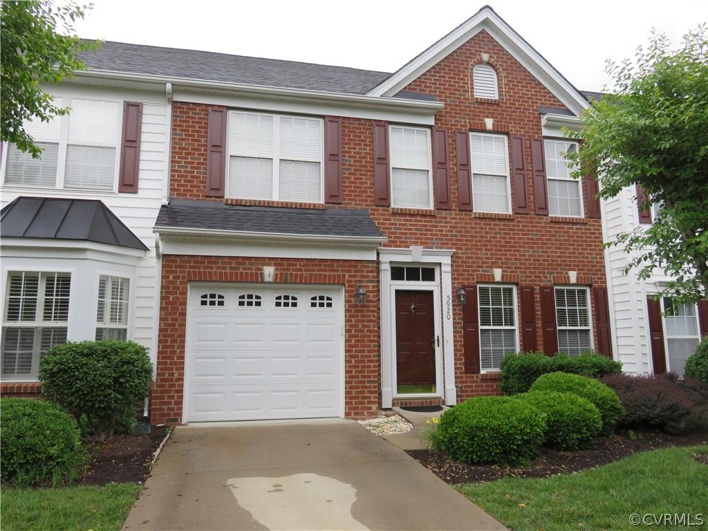 Beautiful, brick front townhouse with first floor master suite in a fantastic Western Henrico locati