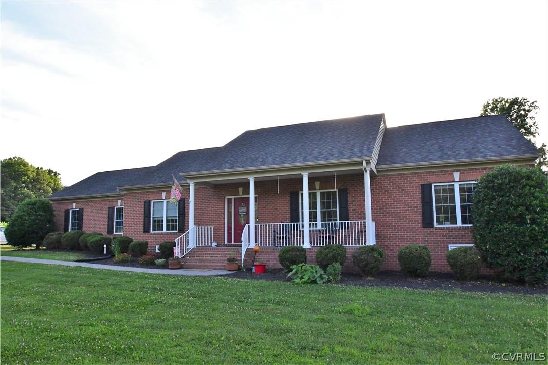 The home you have been waiting for!  Just minutes from the town of Montpelier, VA.  This home features EZ Maintenance Brick and Vinyl.  This Inside Features an Open Concept with a Vaulted Ceiling in the Dining Area, Along with a Gas Fireplace, Ceiling Fan and Recessed Lighting.  The Family Room Features an Arched Entrance, Tray Ceiling  and Wood Floors.  You Will LOVE Cooking in the Spacious Kitchen, Lots of Counter Top Space, Maple Cabinets and a Pantry, Granite Counter Tops and Black Appliances.  The Primary Bedroom Features 2 Walk-in Closets, Wood Flooring, Ceiling Fan and Light and a Full Bath Complete with a Jetted Tub and Separate Shower.  And Do We Have Garage Space, Yes We Do!   There is an Attached 2-Car Garage with a Garage Door Opener and There is an Oversized Detached Garage Compete with Office Space, Work Benches, Peg Board and Storage Shelves!  And  Pool For Your Enjoyment and Relaxation, Privacy Fencing and a Stamped Concrete Patio Perfect for Entertaining and Grilling.  And if That is Not Enough, There is a Chicken Coop!  Black Berries, Raspberries, Grapes and Asparagus are Planted Out Back.  It's Your Turn to Enjoy The Quiet Life.