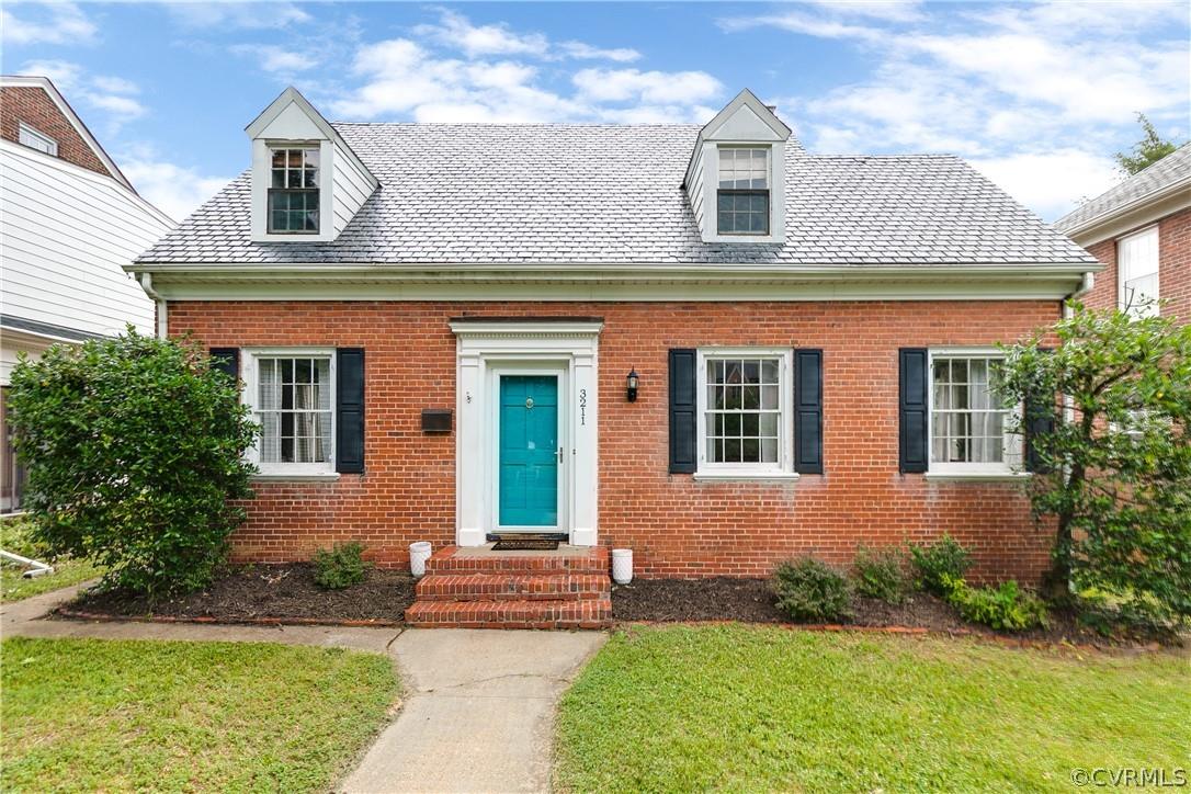 Classic Northside Cape on one of the prettiest streets in Edgewood! This cozy brick home w/ slate ro
