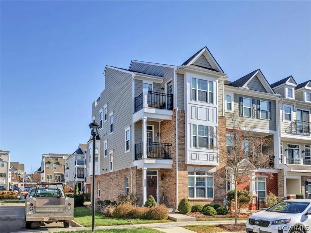 Welcome to the desirable West Broad Village! This three level, end unit is move-in ready!  This Eagl