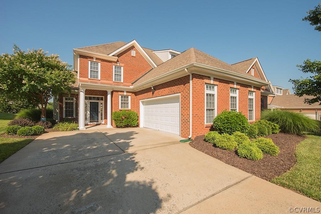 Welcome to this magnificent townhome in the GATED community of The Manor at Hunton Park! You will ce