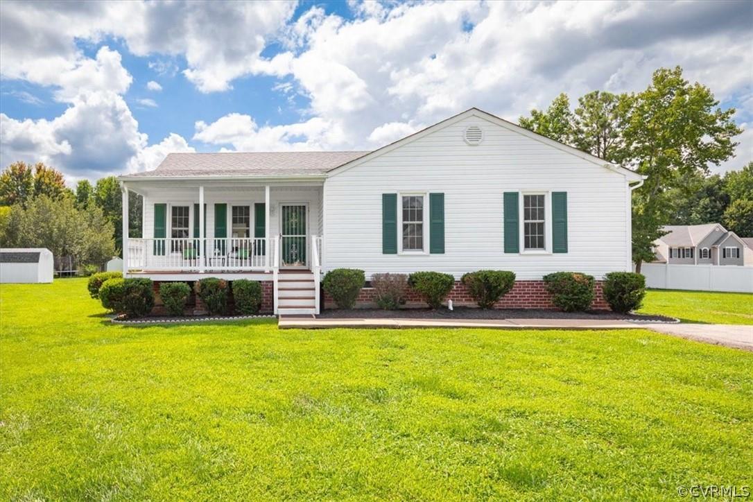 Welcome Home to this easy living, one story, three bedroom, and two full bath property with sunroom!