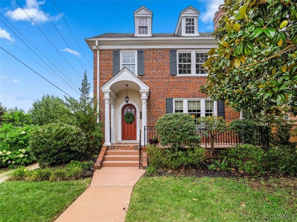 STUNNING BRICK Historic COLONIAL with modern touches perfect for entertaining & relaxation! Main lev