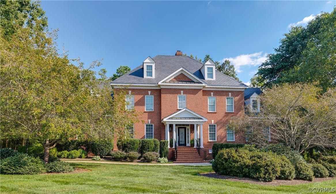 Commanding Brick Georgian with PRIVATE rear grounds and protected common area behind is located in t