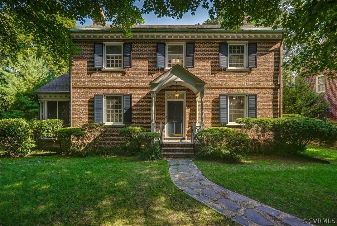 This stately colonial with classic Northside charm is renovated throughout! Natural light abounds in