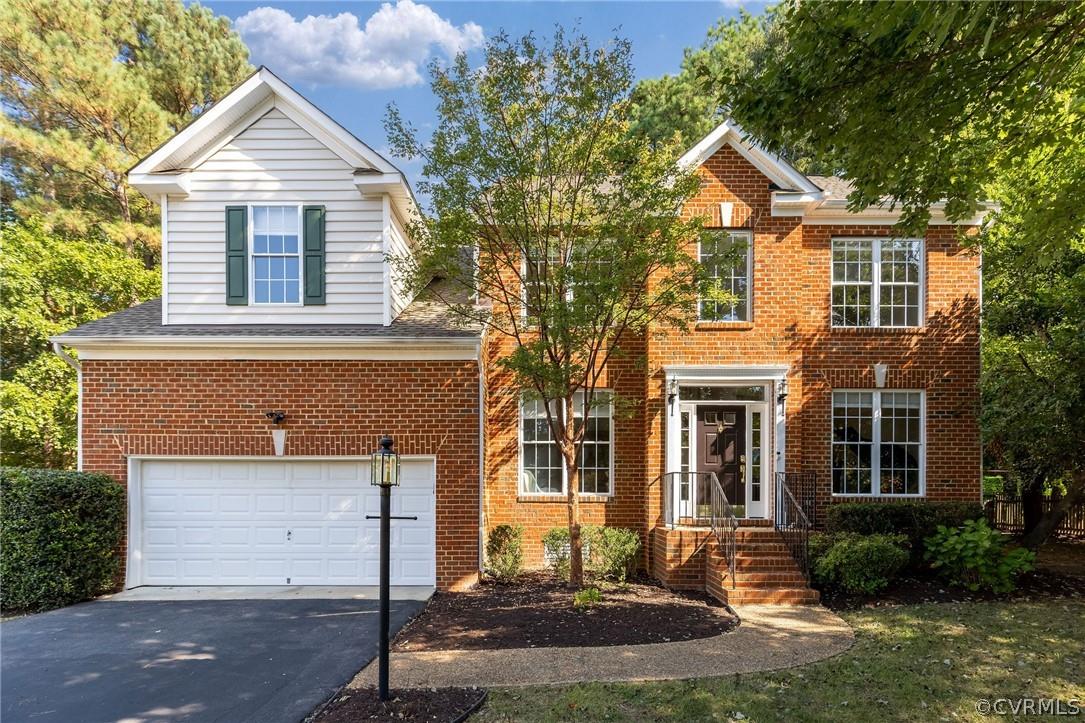 Welcome to this stately brick/vinyl sided transitional style home located on a quiet cul-de-sac in t