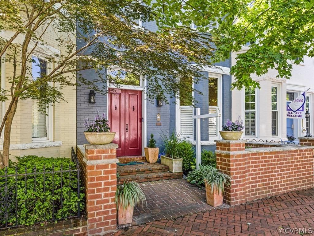Welcome to this 19th century classic row home located in the intimate 3 block neighborhood of West A