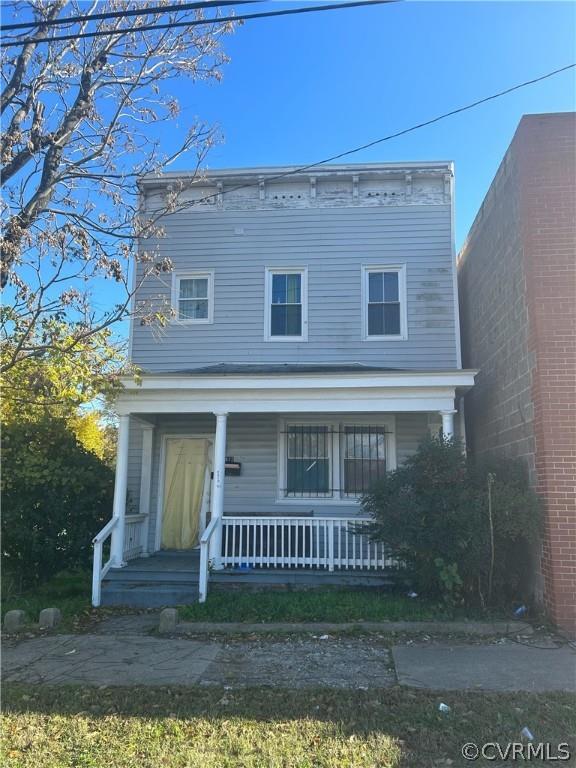 Great two-story investment property zoned residential & commercial (B-3 - Business) and ripe for a r