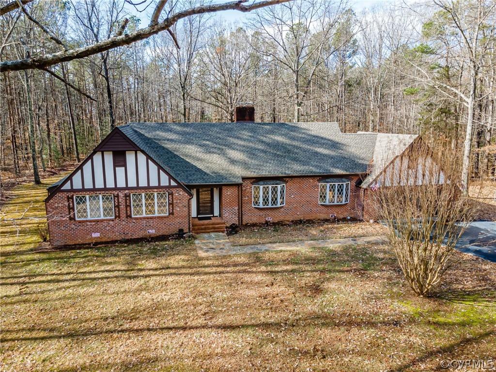 THIS 3 BDRM 2.5 BA BRICK RANCH HOME NESTLED ON 10.47 ACRES IN HANOVER COUNTY IS READY FOR NEW OWNERS