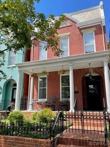 Timelessly renovated in 2022, large front porch with garden, steps away from iconic Monument Ave &  