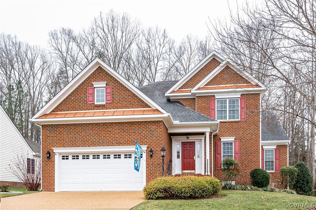 Must see this meticulously maintained 2-story brick transitional home in the low-maintenance communi