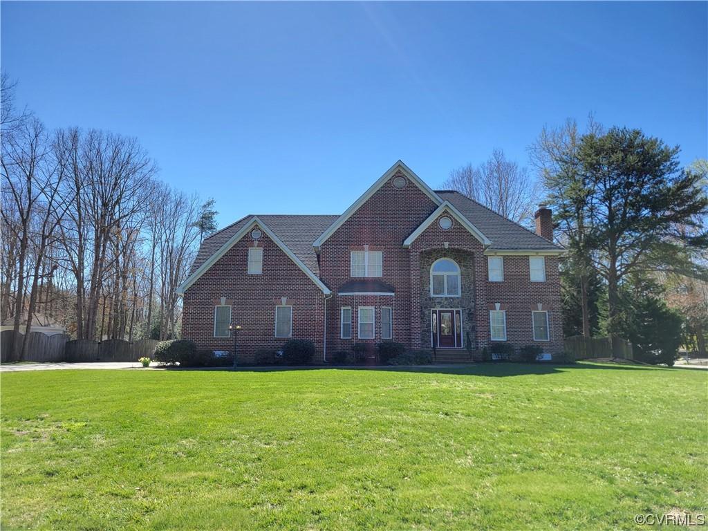 This phenomenal all brick home features 5 BRs, 4 Bths. Stunning 2-story foyer with hardwood floor, b