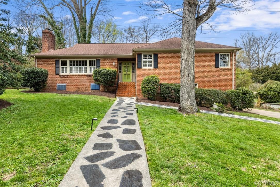 Location, location, location!! This spacious brick ranch is situated on a scenic lot at the edge of 