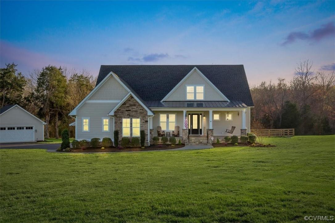 Check out this beautiful home in the coveted community of Breeze Hill in Goochland County. Why wait on new construction when you can buy this custom built, like new home with many upgrades & additions. This "Hallmark Floor Plan" from James River Custom Homes was completed in 2018 as a former model home and has only been lived in since May 2021! Home features 5 bedrooms & 3.5 bathrooms, 1st floor master, hardwood floors, 10' ceilings, full front porch, covered rear porch & detached 2 car garage! Seller has added many upgrades post-construction including but not limited to: 2 car detached garage, whole home generator, beautiful paver patio, landscaping/lawn improvements, rear fence, and irrigation system. Inside you will find an open yet cozy floor plan that is great for entertaining! The living room has a gas fireplace with bluestone hearth and surround & built-in bookcase. The 1st floor master suite has a large WIC, beautifully tiled bathroom, double vanity, water closet and huge spa-like shower. Upstairs you will find 4 additional bedrooms and 2 full baths, along with a HUGE storage closet(28x9). This home is just a short walk away from the community pond, a dream for any family!