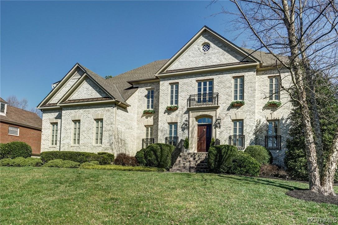 This Exquisite custom transitional white brick home is located on a private cul de sac in Westcott a