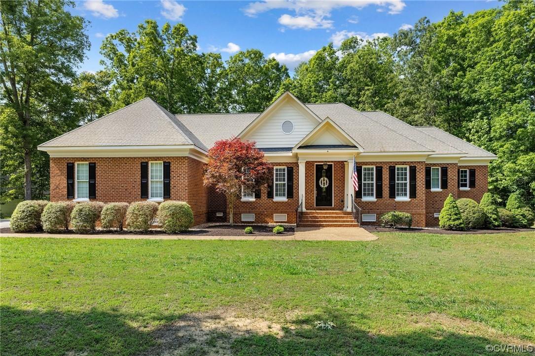 Stunning Custom All Brick Home on the 15th Fairway of Mill Quarter Golf Course. This Custom Home off