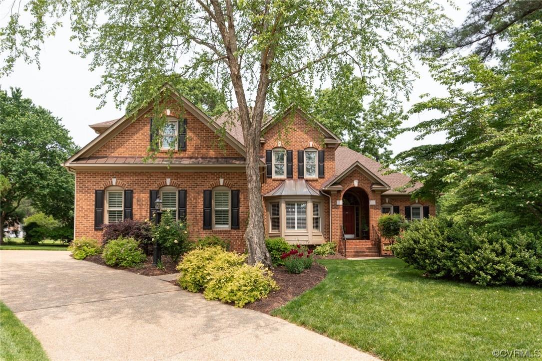 Absolutely stunning all-brick home sits at end of quiet cul-de-sac and overlooks Dominion Club golf 