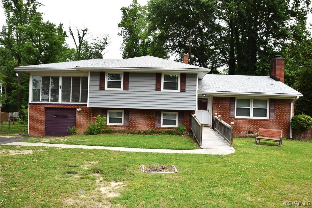 This midcentury modern tri-level is well built with some important upgrades: 2014 Window replacement