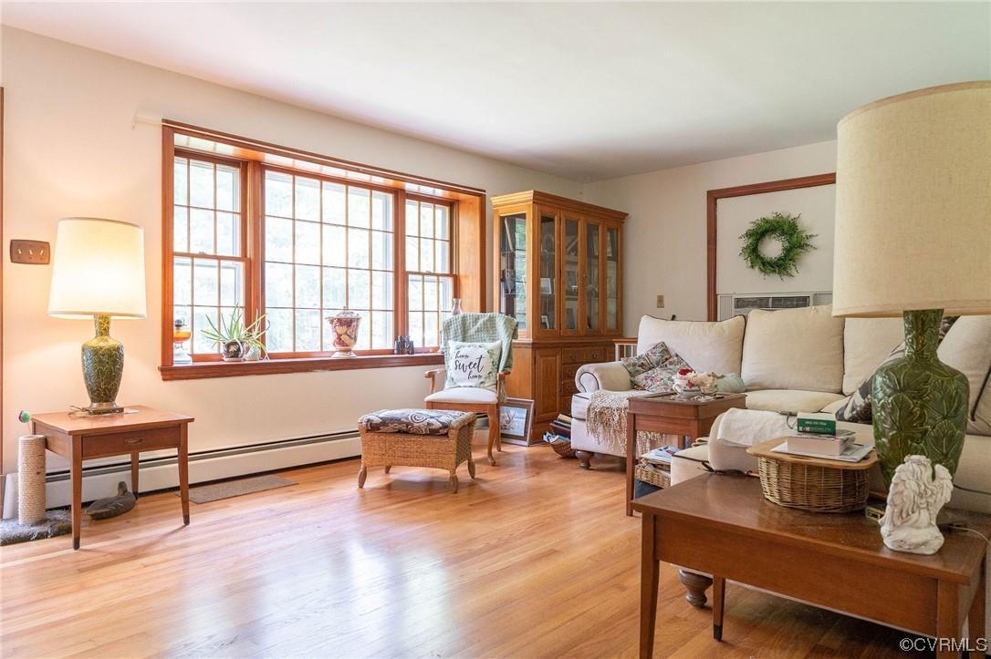 Almost 2 acres in the heart of Chester!  This beautiful brick ranch with a full walk out basement is