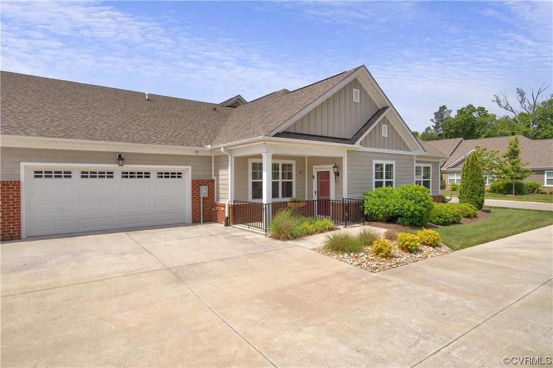Move-in Ready! Welcome to 7437 Kousa Drive in the beautiful Villas at Dogwood 55+ Community of Chesterfield County at the Swift Creek Reservoir. This one-owner Randolph floorplan by Eagle Construction was built in 2017 and features 2 first-floor bedrooms (both with new carpet) & 2 full bathrooms over 1,744 sqft of open-concept living space that includes a recently finished walk-up attic that has been converted into the perfect office or craft space. The bright & open living room/dining/kitchen area has 5" engineered hardwood floors, a vaulted ceiling & gas fireplace. The upgraded kitchen has granite counters/breakfast bar, pantry, stainless steel appliances & maple cabinets. The primary bedroom suite has a large walk-in closet & ensuite bathroom with step-in shower. The attached 2-car garage has ample room for extra storage & the covered front porch has been fenced/enclosed for pets. Monthly HOA ($265) Includes: Irrigation, Lawn Maintenance, Exterior Siding, Trash, Snow Removal, Sidewalks, Street Lights & Clubhouse w/ 24-hour fitness center, library, gas grill & covered patio. In the heart of the Moseley/Midlothian and centrally located to 288, Powhite & area shopping/restaurants.