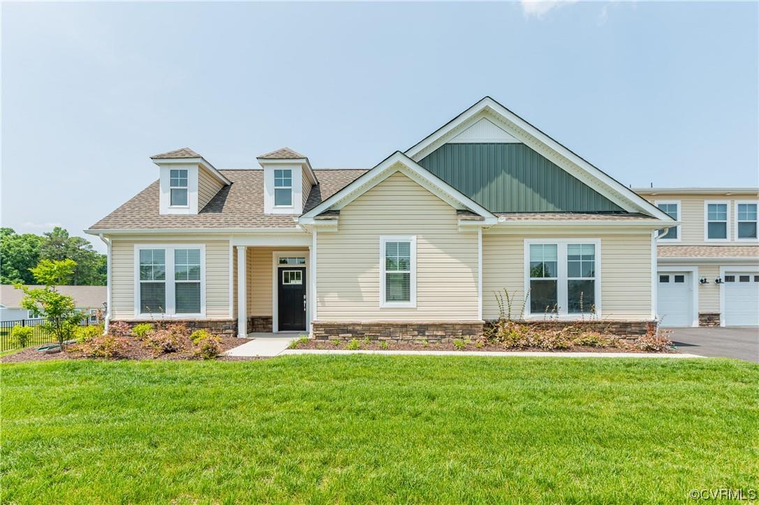 Welcome home to 10473 Hargrove Farms Lane! This newly built condo is nestled in the new Chickahominy