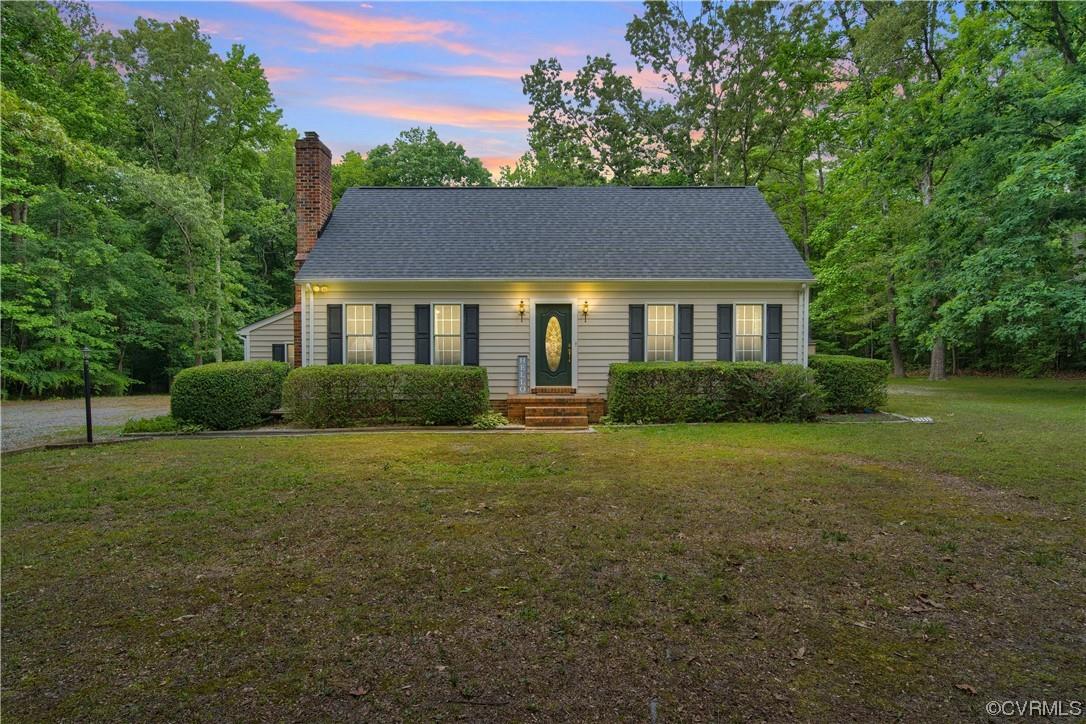 Just listed in the Cold Harbor area of Northeastern Hanover County. Welcome to 7459 Flannigan Mill Road. This 2-story vinyl-sided cape home sits on a private 1.32 acre lot and has 3 bedrooms & 2.5 bathrooms over 2400 sqft of living space. Upon entering you are greeted with hardwood floors a gas fireplace in the flexible dining/formal listing space. The eat-in kitchen has ample storage and leads you to the one-of-a-kind family room/den with an incredible valued beam ceiling, an additional gas fireplace & walk-out access to the screened rear porch. The first floor is completed with an over-sized laundry room w/ extra storage, 2 bedrooms & a full bathroom. The 2nd floor of the home has 2 additional bedrooms & an additional full bathroom. The exterior of the home has a large gravel parking area (perfect for someone with many drivers), ample open yard for kids or pets to play & a detached shed with wooded areas on all sides. Although rural in the setting, the home sits only 20 minutes to the shopping/dining of central Mechanicsville and just 25 minutes to downtown Richmond. Strong 5G Verizon home internet is available for remote workers & gamers.