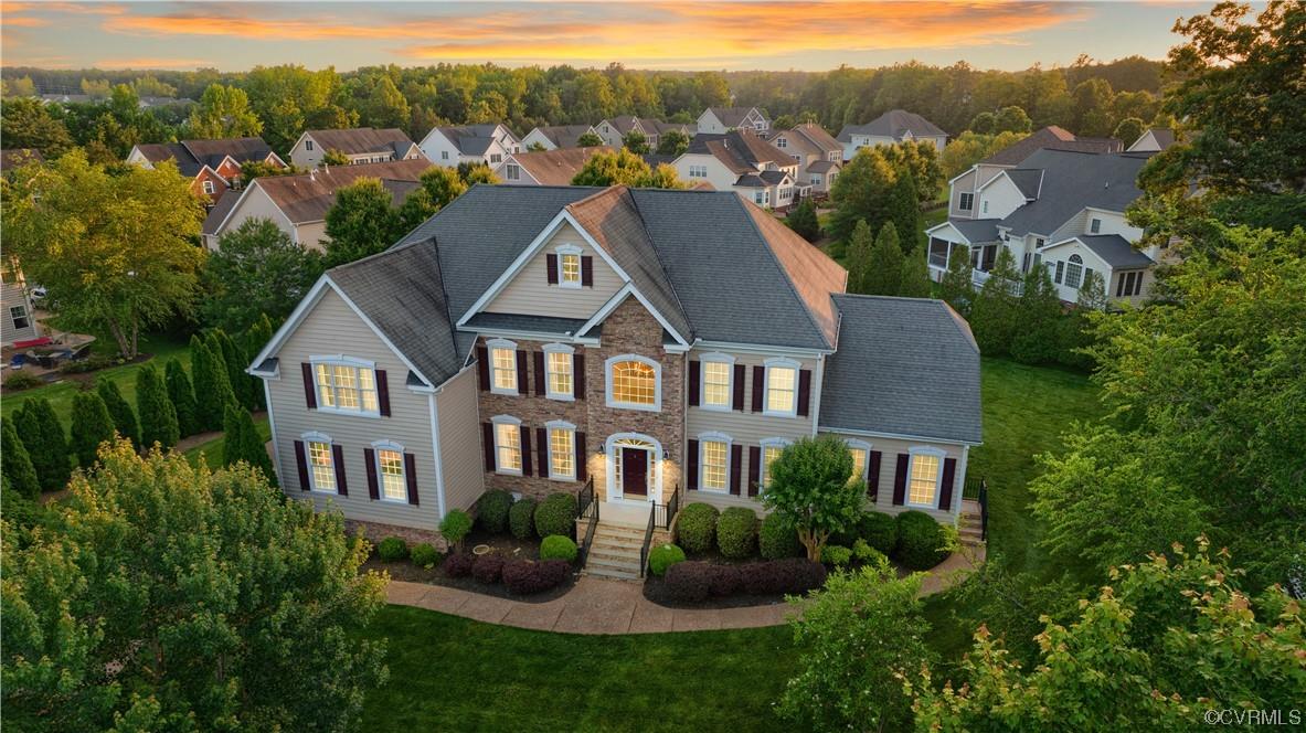 Welcome to 6418 Rivershook Terrace in the beautiful Foxcreek subdivision. This Parker Orleans Bradford Grand Model boasts 5 bedrooms (including a rare 1st floor in-law suite) & 4.5 bathrooms over 3 levels & 5,365 sqft of living space. Upon entering, you are greeted with hardwood floors, vaulted ceilings & formal mouldings. The 1st floor in-law suite features a sitting room, bedroom, handicap-accessible bath with roll-in shower & separate entrance. The open-concept kitchen has a large center island, granite counters & morning room with double-sided fireplace shared by the 2-story family room. Two staircases lead you to the 2nd floor which is highlighted with an oversized primary bedroom suite with office/workout area, 2 walk-in closets & upgraded ensuite bathroom. This level is completed with 3 additional bedrooms & 2 full bathrooms. The 3rd floor is flexible as a bonus/rec room or possibly a 6th bedroom and has ample walk-in attic storage. The exterior of the home has a 3-car side-entry garage, aggregate driveway, deck w/ awning, hot tub, 4-sided irrigation, mature landscaping/plantings on a nearly half-acre lot & sits on a private cul-de-sac. HOA includes pool, clubhouse & trails.