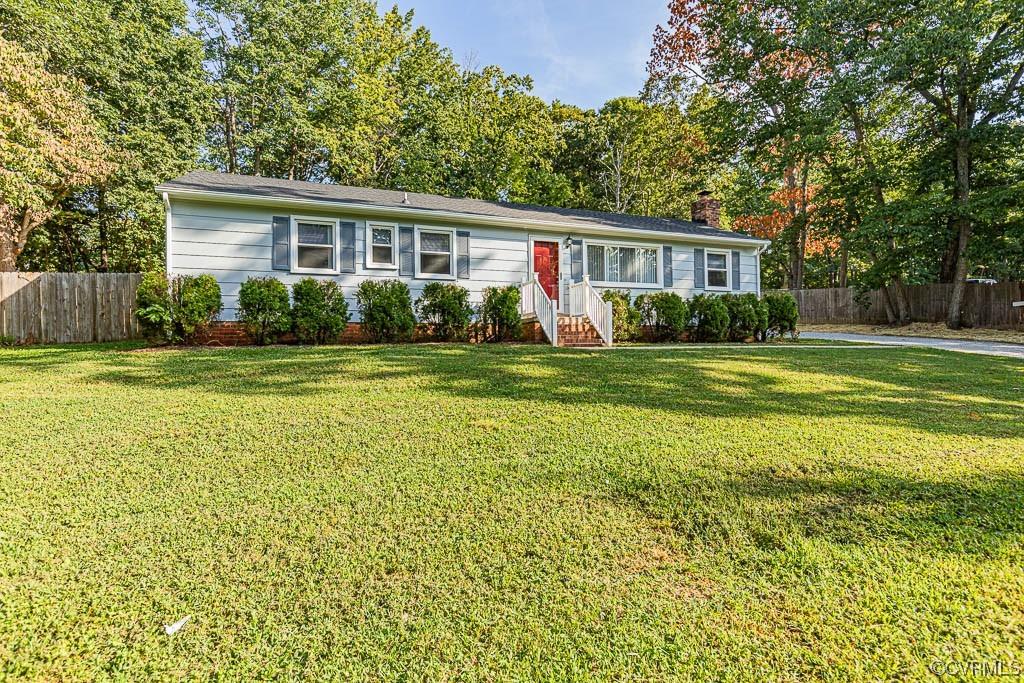 Welcome to your new home in Chestnut Oaks, Powhatan County! This spacious single-family residence of