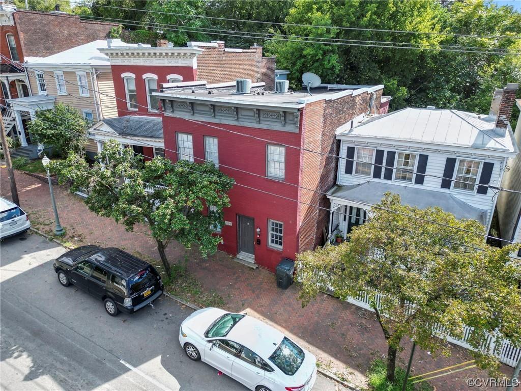 REVENUE-GENERATING TWO-STORY DUPLEX IN CHURCH HILL. Featuring 2 units. Each boasts 3 bedrooms, 2 ful
