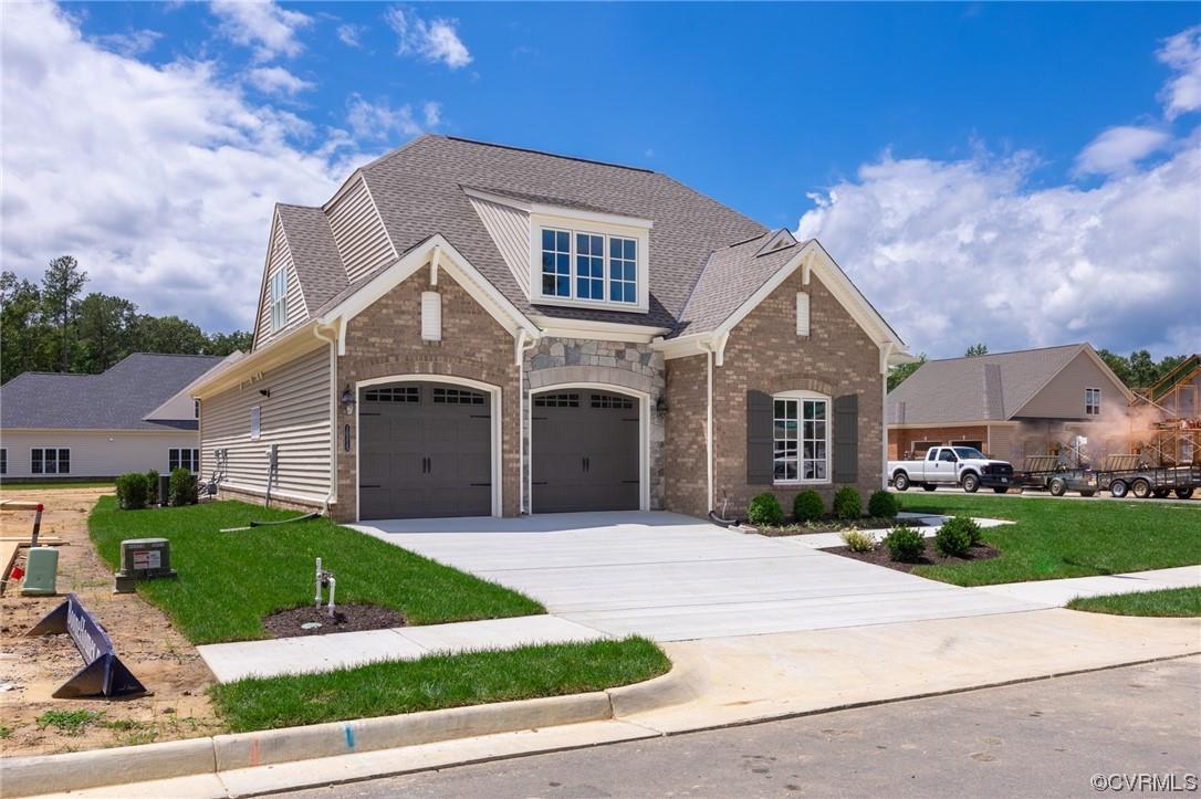 The Southwick opens into a large foyer and dining room. A first-floor Owner's Suite with dual walk-i