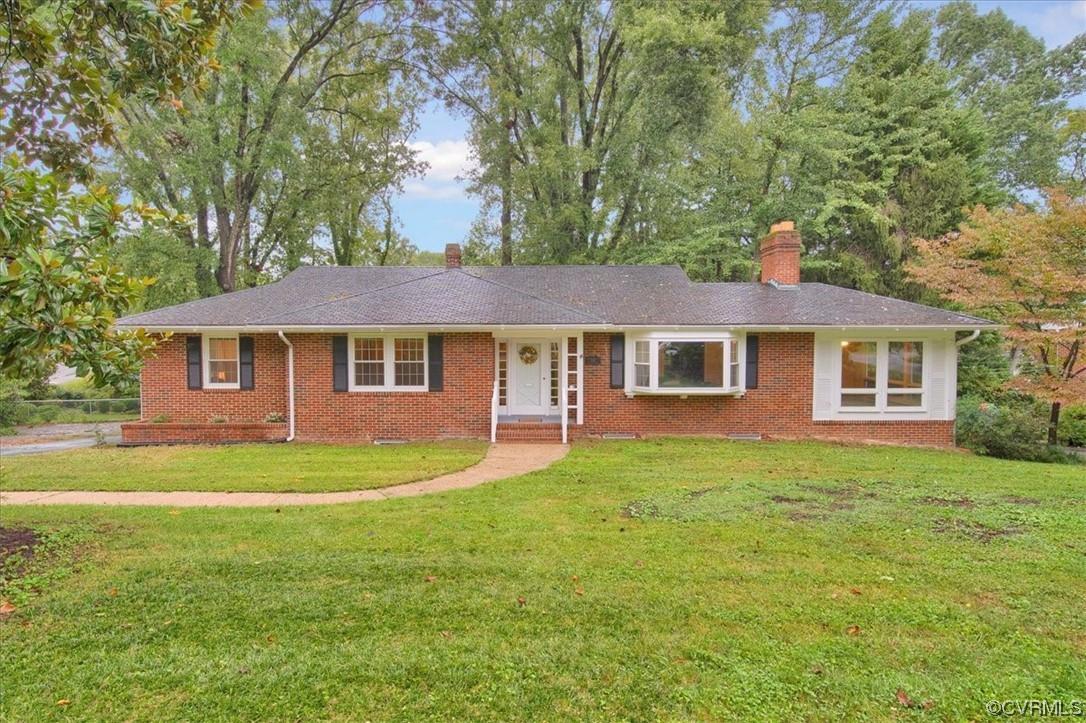 Welcome home to this well-maintained brick rancher, now available in the heart of the highly sought 